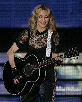madonna smiling and playing guitar-4654